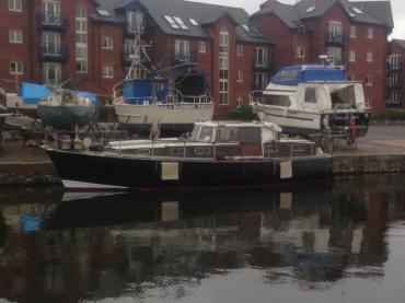 Galdwall of Brundall moored alongside a quay