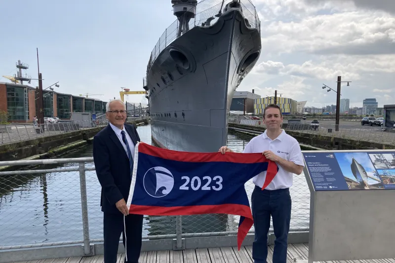 HMS Caroline being presented with the Flagship of the Year Award