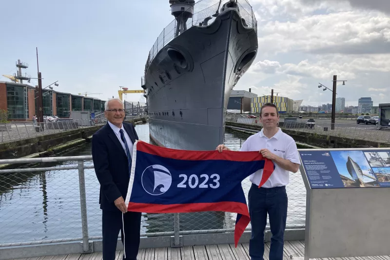 HMS Caroline being presented with the Flagship of the Year Award