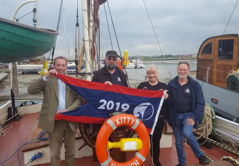 SB Kitty pennant presentation