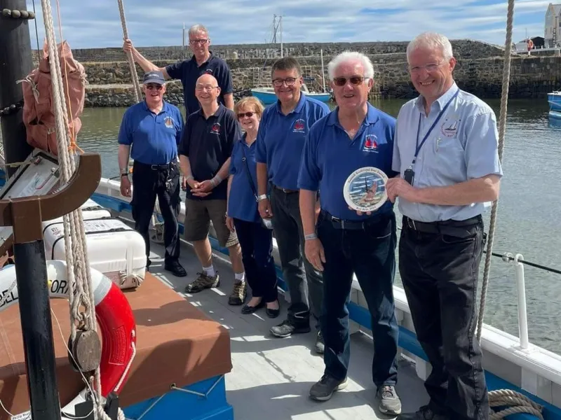 The Wick Society Boat Team on board the vessel