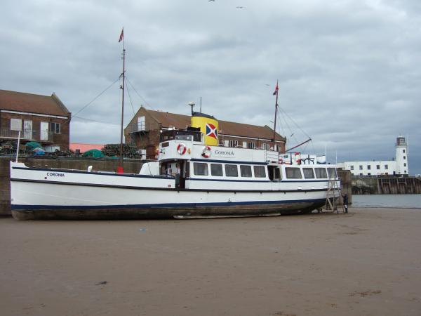 Coronia - beached in Scarborough, being painted 2008