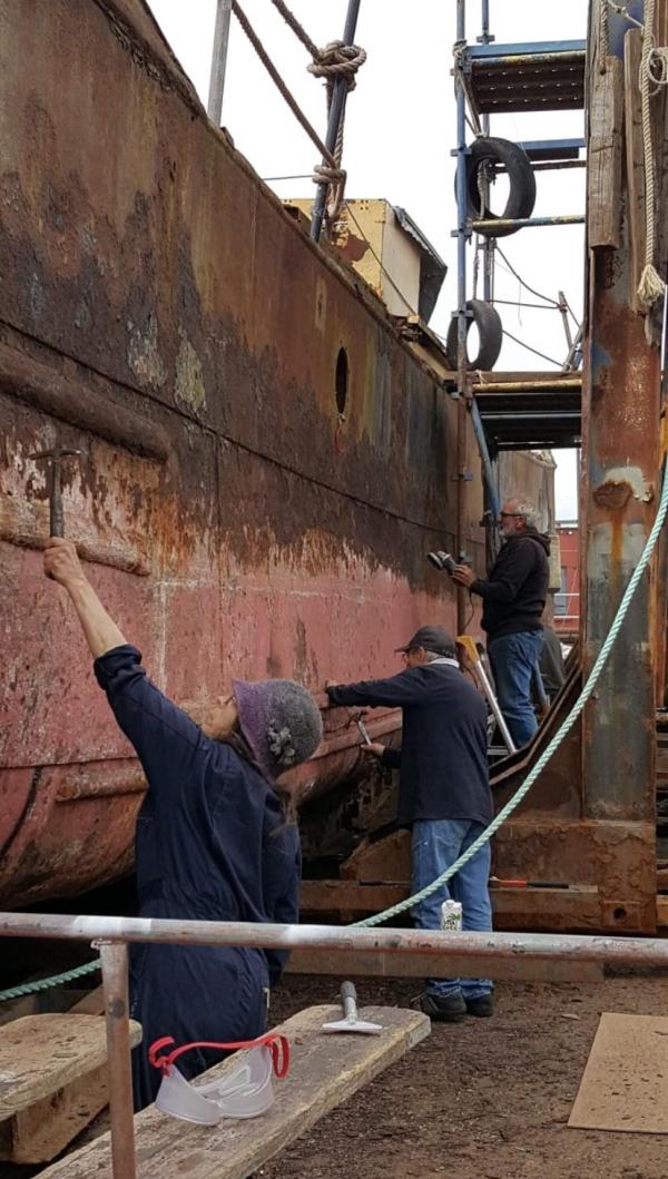 Work on Barge Number 9's hull