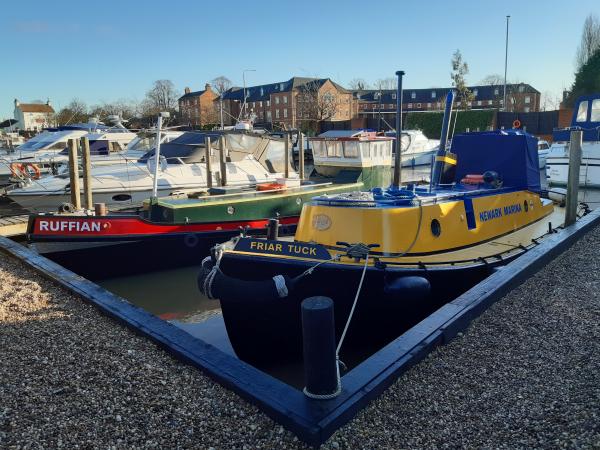 Friar Tuck (right) moored alongside Ruffian, December 2023