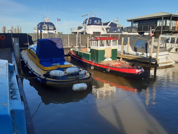Friar Tuck (left) moored alongside Ruffian, December 2023
