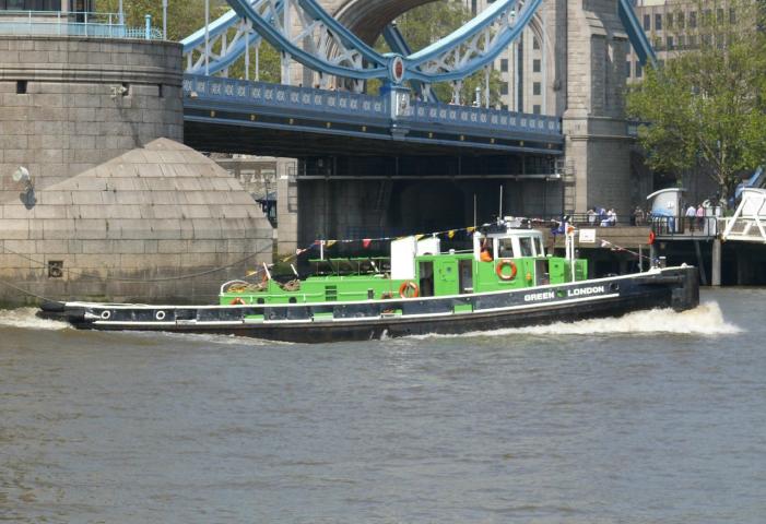 Green London sailing by Tower Bridge