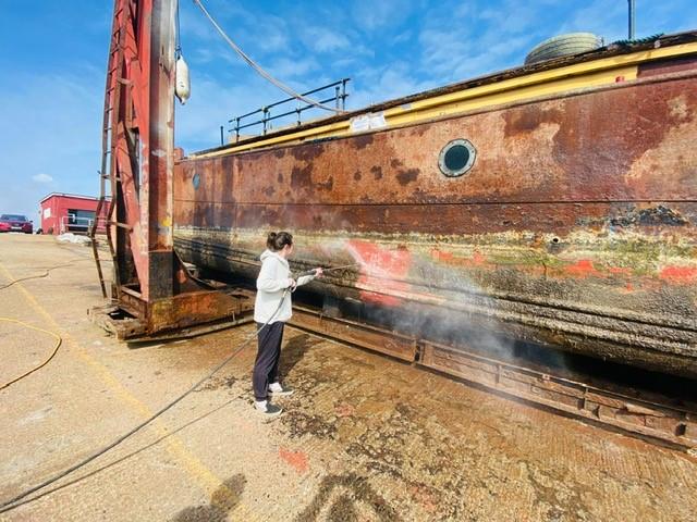 Work on Barge Number 9's hull